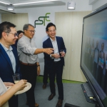 Guests enjoying the photo slides - the memory lane